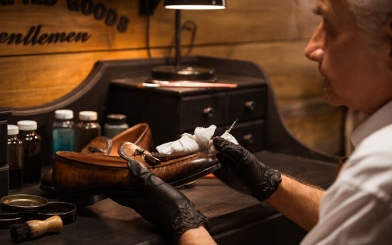 polishing a leather shoe