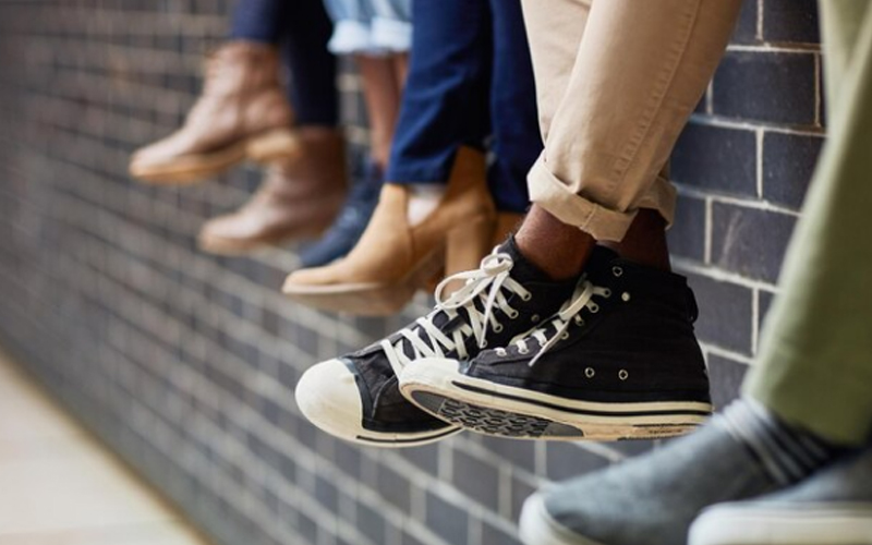 people wearing different types of shoes