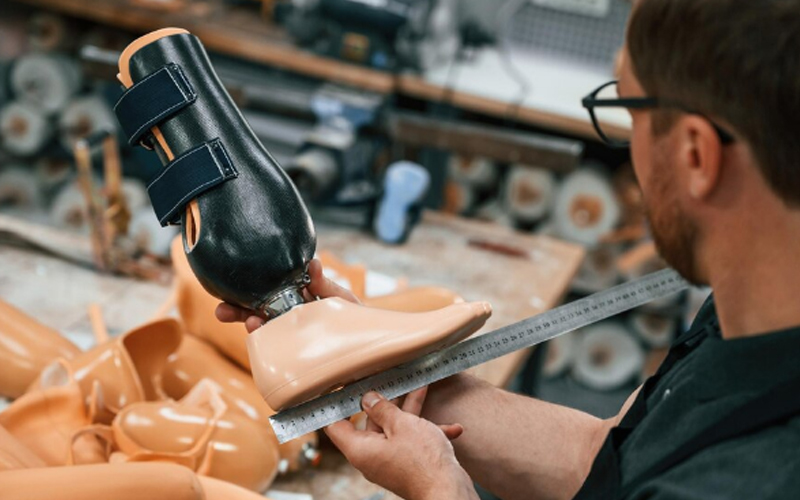 a man working in a modern shoe factory