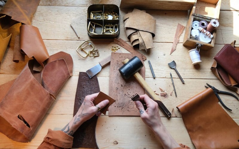 a shoemaker starts making shoes