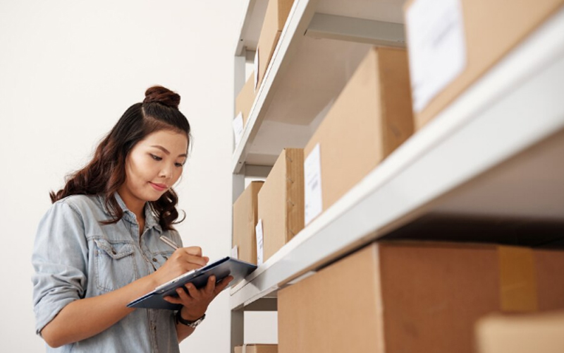 a worker checking inventory